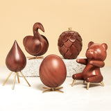 Brainchild – Træfigur – Svane Figuren – Mahogni – Messing