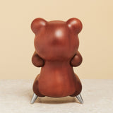 Brainchild – Træfigur – Bamse Figuren – Mahogni – Stål