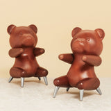 Brainchild – Træfigur – Bamse Figuren – Mahogni – Stål